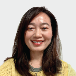 A portrait photograph of Grace Lee